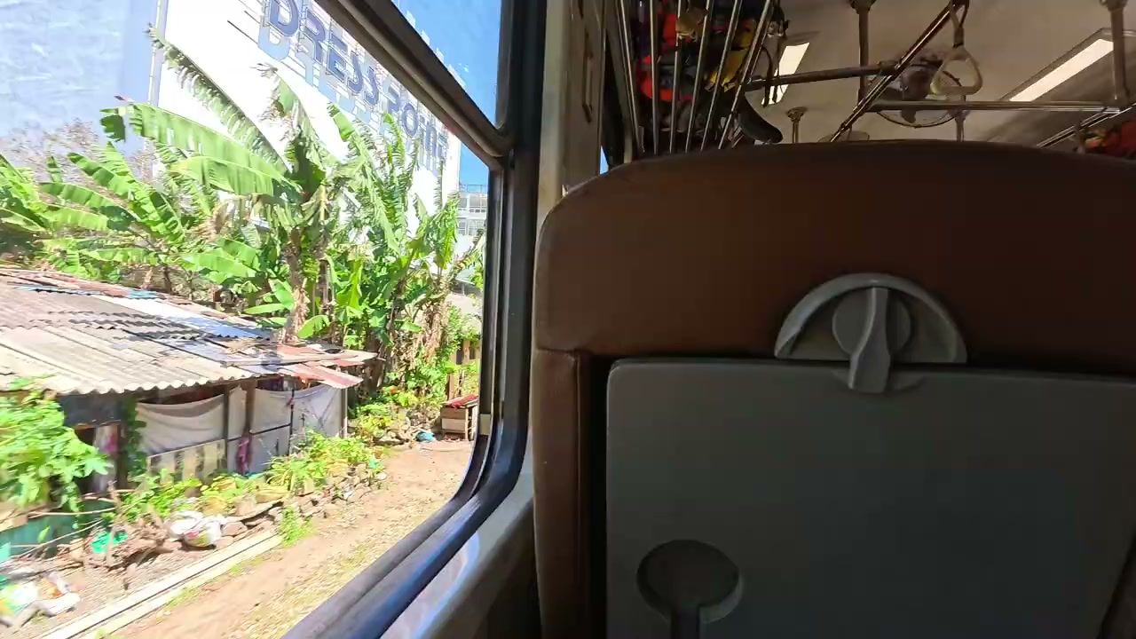 View through the open window of the Sri Lanka hill country train