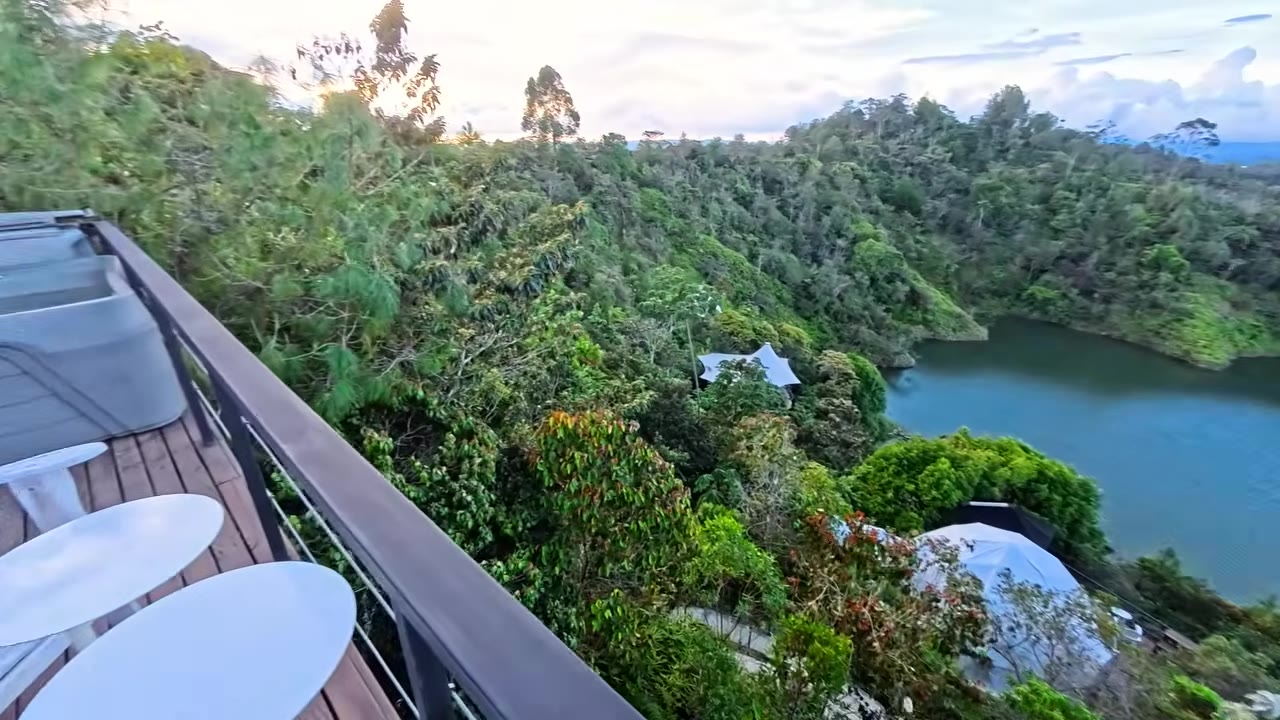 View across the Peñol-Guatapé Reservoir from a glamping terrace
