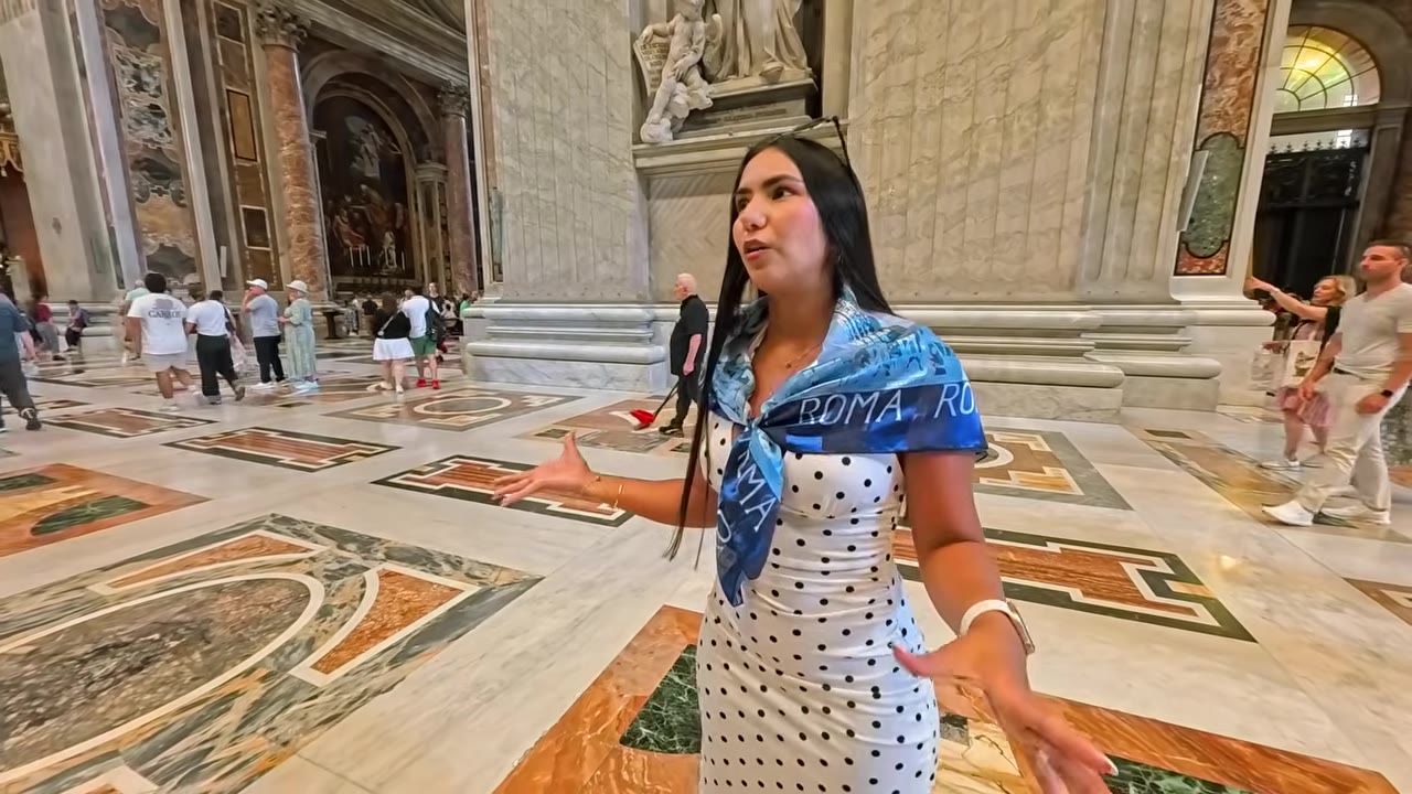 Interior details and visitors inside the Vatican Museums in Rome