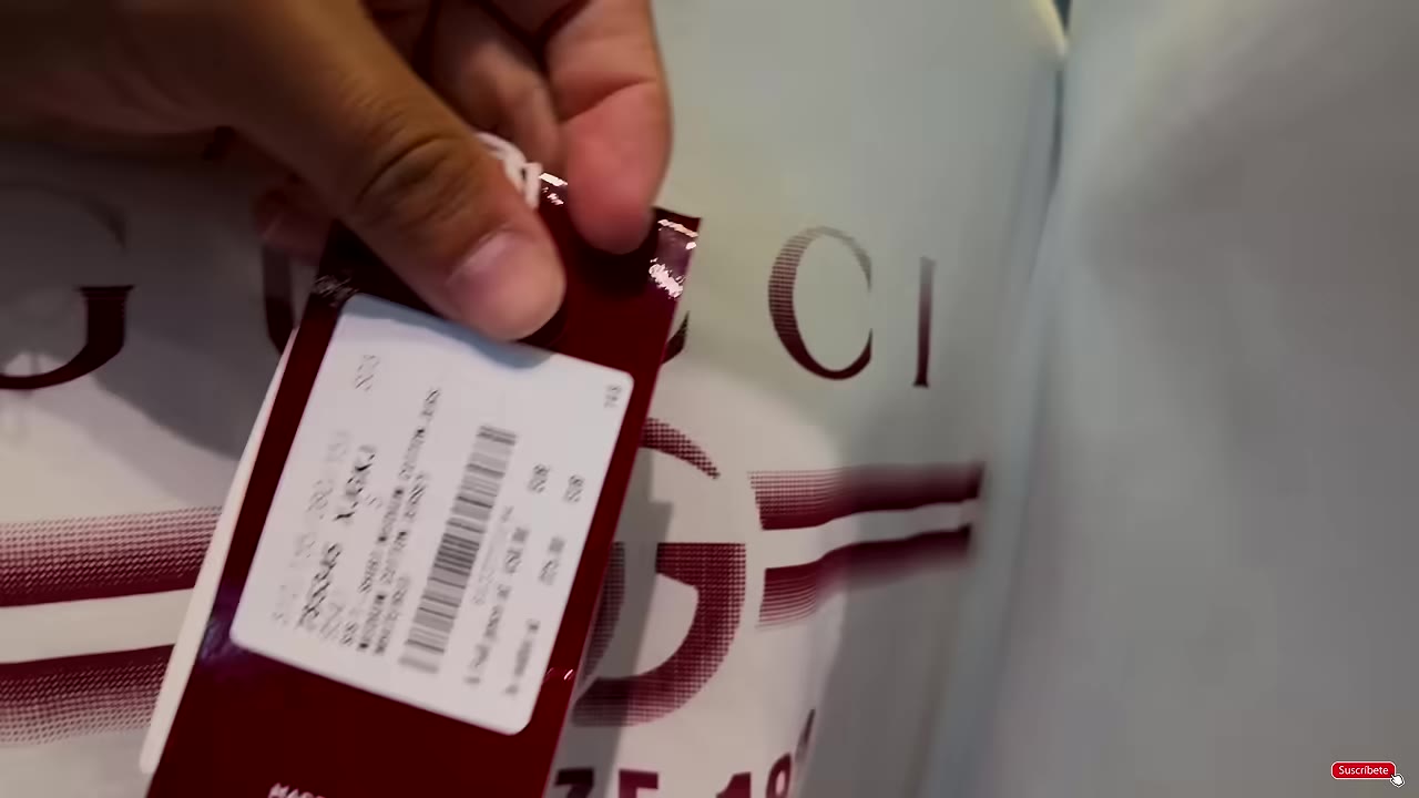 Designer handbags and fashion displays at an Italian luxury outlet